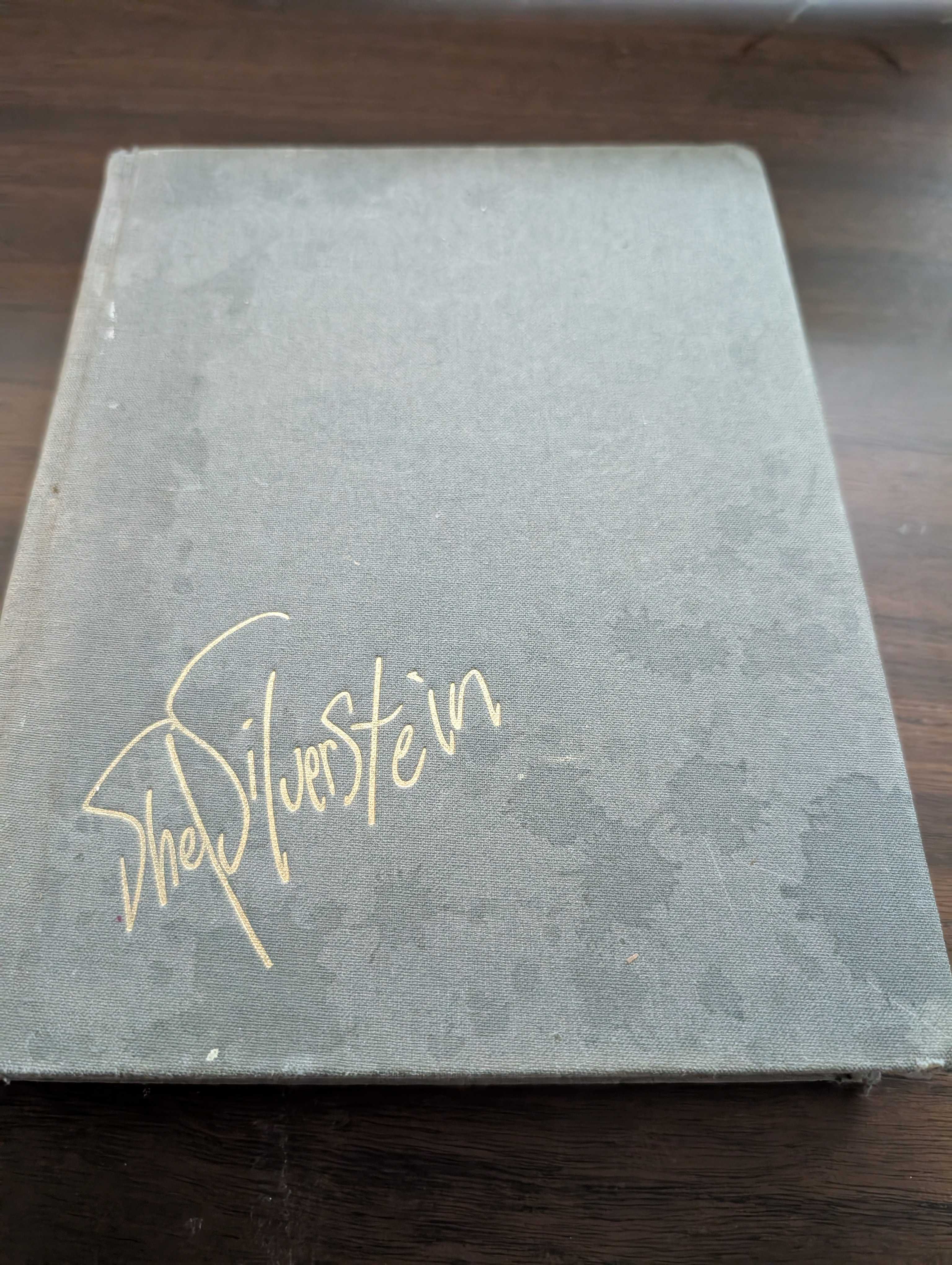 Staining to the cover or any internal pages